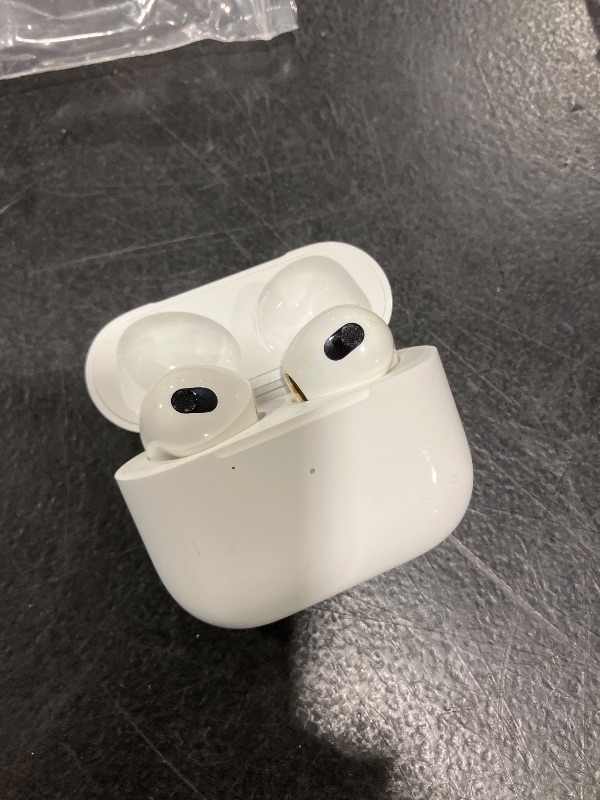 View 4 of Apple AirPods (3rd Generation) Wireless Earbuds with MagSafe Charging Case. Spatial Audio, Sweat and Water Resistant, Up to 30 Hours of Battery Life. Bluetooth Headphones for iPhone