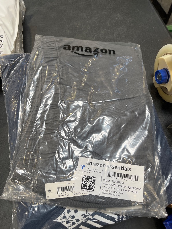 Photo 1 of Amazon Essentials Girls' Pleated Uniform Skorts with Built-in Shorts, Pull-on, Stretchy, Pack of 2, Grey, Medium