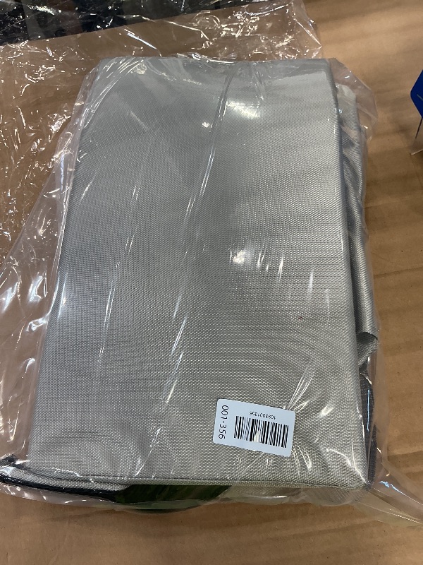 Photo 1 of large silver duffel bag