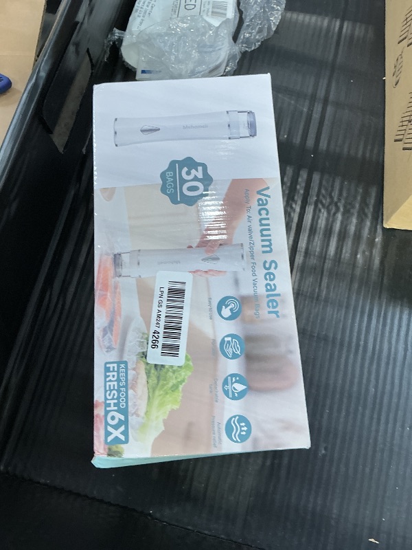 Photo 1 of Mehomeli Compact Handheld Vacuum Sealer with 30 Reusable Bags