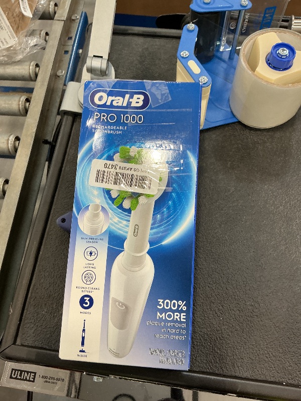 Photo 1 of Oral-B Pro 1000 Rechargeable Electric Toothbrush, White