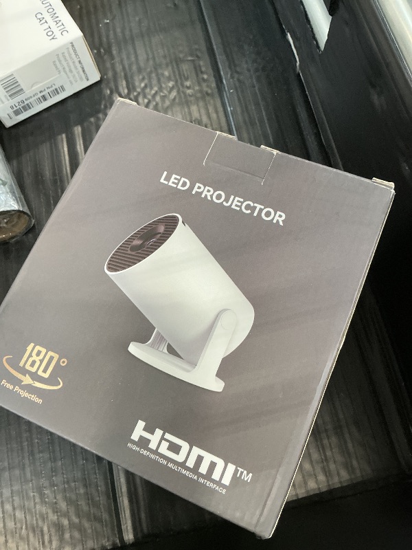 Photo 1 of Thunrlge Mini Projector, Portable Smart Projector 4K WiFi 6 BT 5.4