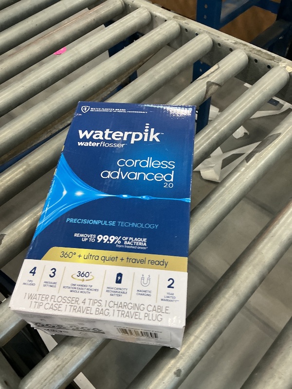 Photo 1 of Waterpik Cordless Advanced Water Flosser - White