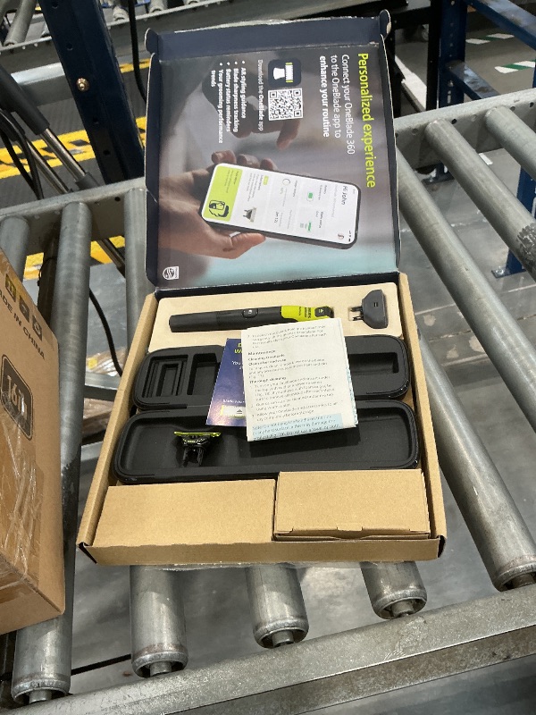 Photo 1 of Norelco OneBlade 360 Face + Body Trimmer with Connectivity