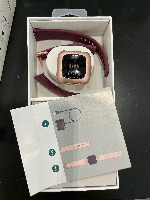 Photo 1 of Fitbit Versa 2 Health and Fitness Smartwatch with Heart Rate, Music, Alexa Built-in, Sleep and Swim Tracking, Bordeaux/Copper Rose, One Size (S and L Bands Included)
