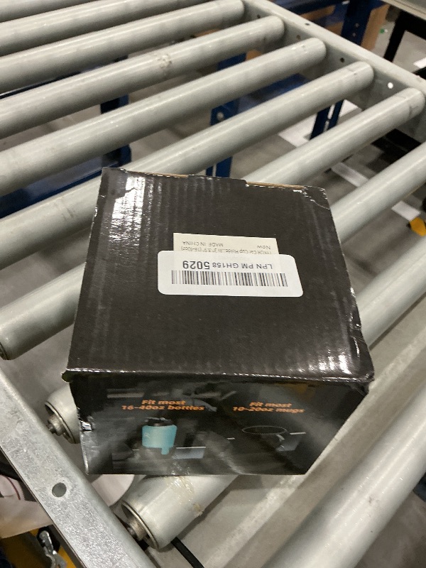 Photo 1 of TYKOR Car Cup Holder Expander