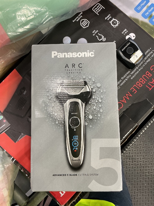Photo 1 of Panasonic ARC5 Electric Razor for Men with Pop-Up Trimmer, Wet/Dry 5-Blade Electric Shaver with Intelligent Shave Sensor and Multi-Flex Pivoting Head, ES-LV65-S (Silver)