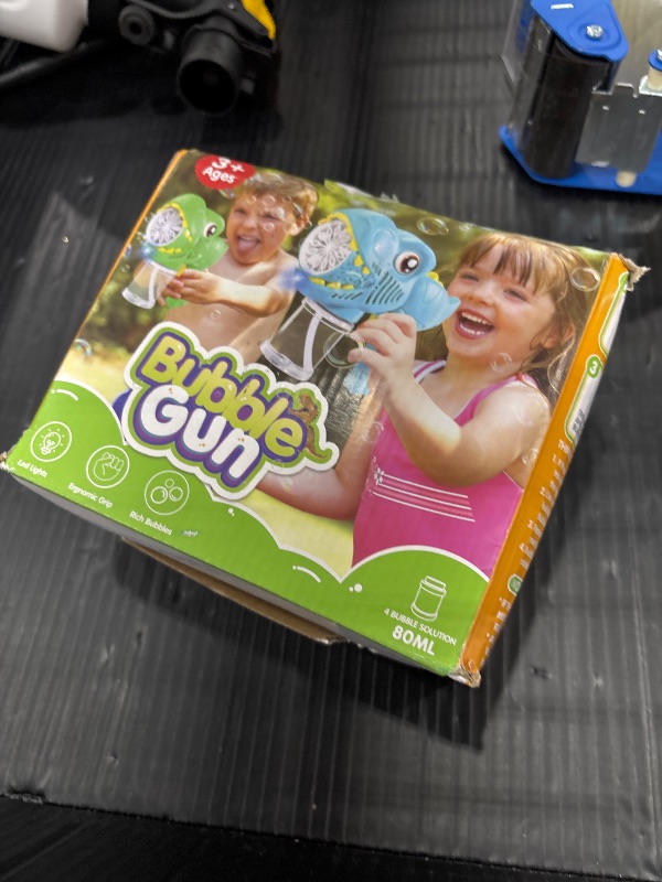 Photo 1 of Yunaking Dinosaur Bubble Gun 2 Pack