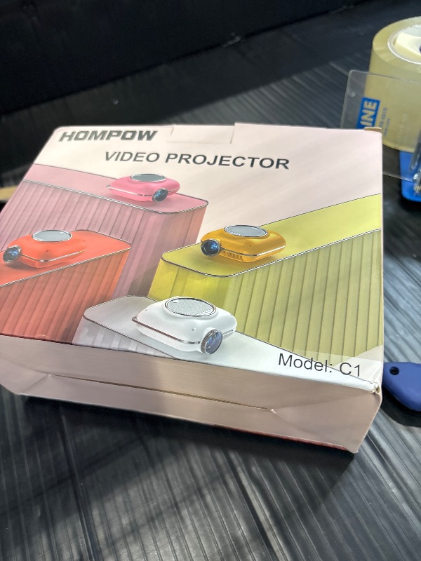 Photo 1 of HOMPOW Mini Projector, 1080P Supported Portable Bluetooth projector