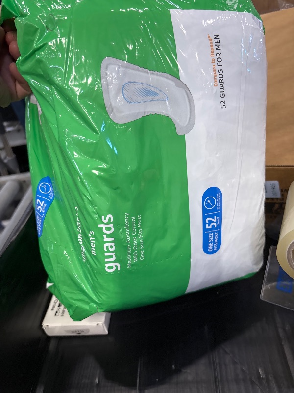 Photo 1 of Amazon Basics Men's Incontinence Guards, Maximum Absorbency, 52 Count, (1 Pack of 52), Packaging May Vary