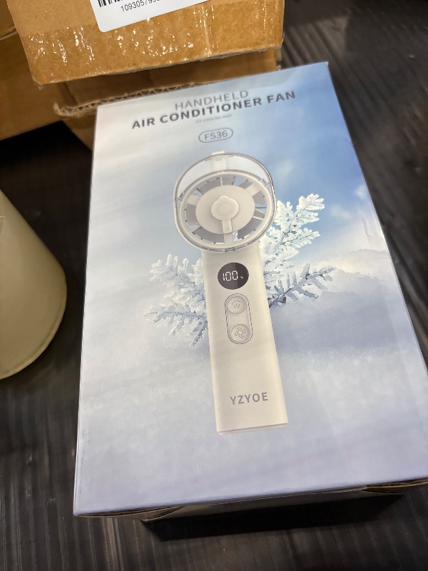 Photo 1 of YZYOE Rechargeable Handheld Fan with Refrigeration Spray