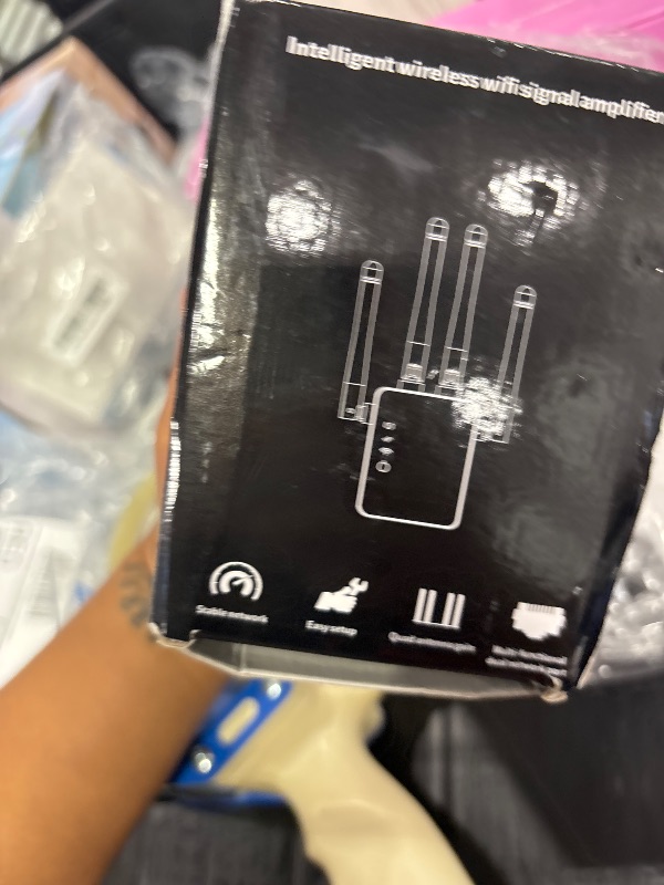 Photo 1 of Aodcaopul WiFi Repeater Wireless Signal Booster - Pearl White