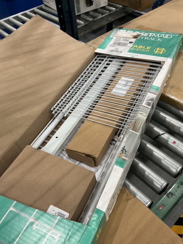 Photo 1 of ClosetMaid ShelfTrack Wire Closet Organizer System, Adjustable from 4 to 6 Ft., With Shelves, Clothes Rods, Hardware, Durable Steel, White