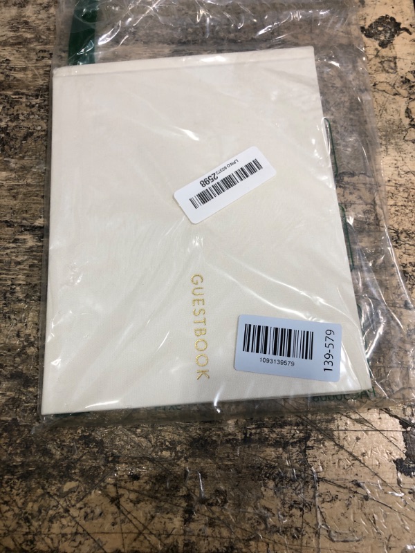View 2 of *** UNKNOWN NUMBER OF PAGES TORN FROM THE FRONT, NO APPARENT DAMAGE TO BOOK ITSELF AND NOT NOTICABLE ***
ZICOTO Wedding Guest Book, Beige Linen, Gold Foil Lettering, 9x7"