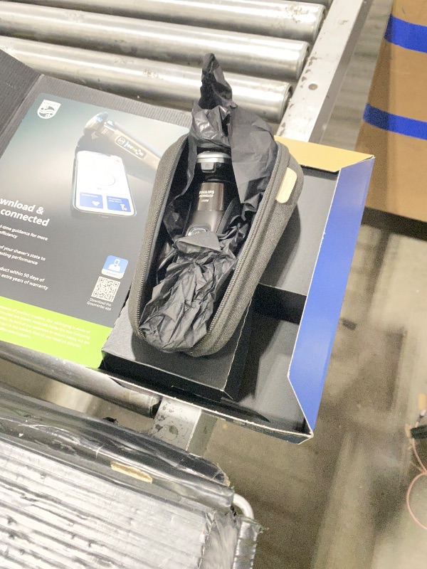 View 2 of Philips Norelco i9000 Electric Shaver with Charge Stand & Nose Trimmer, Black