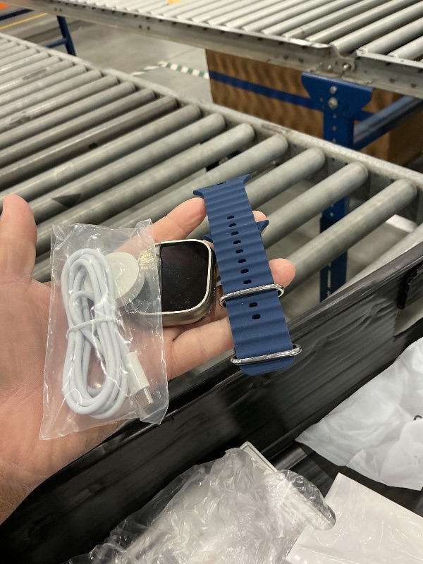 Photo 1 of Apple Watch Ultra 2 [GPS + Cellular 49mm] Smartwatch with Rugged Titanium Case & Blue Ocean Band. Fitness Tracker, Precision GPS, Action Button, Extra-Long Battery Life, Bright Retina Display