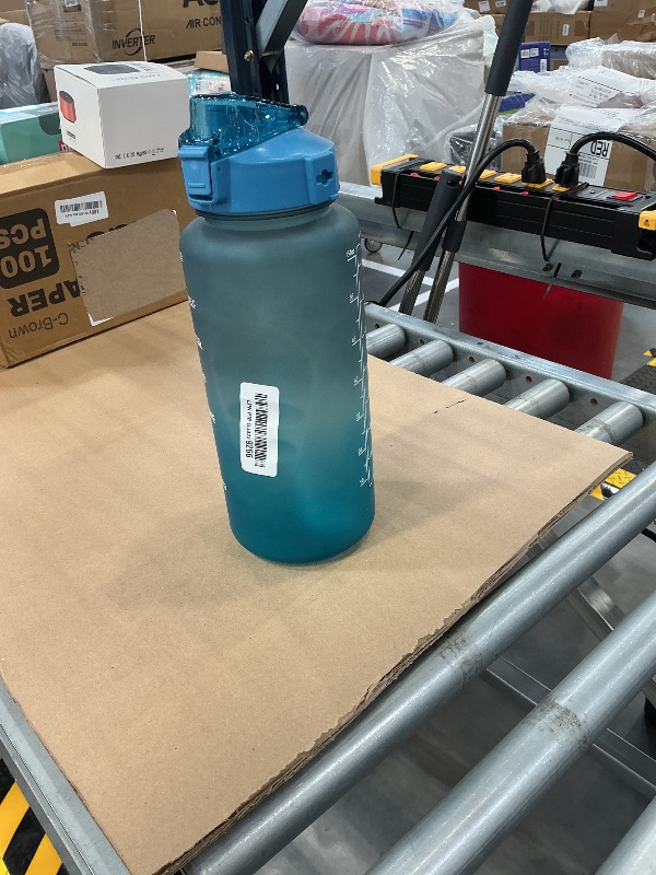 Photo 1 of EYQ 64oz Water Bottle with Straw