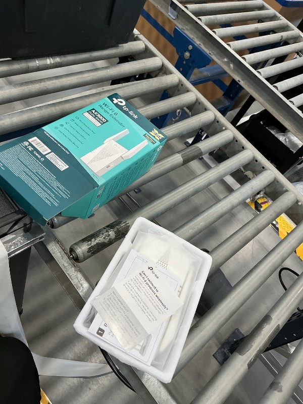 Photo 1 of TP-Link AX3000 WiFi 6 Range Extender RE715X