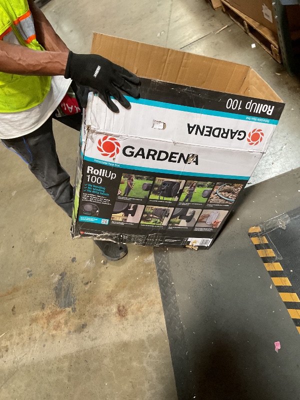 Photo 1 of GARDENA Retractable Garden Hose Reel - 100 Feet - Auto Retract Hose Reel with 180° Swivel Wall Mount - Heavy Duty - Includes Spray Nozzle - 20505