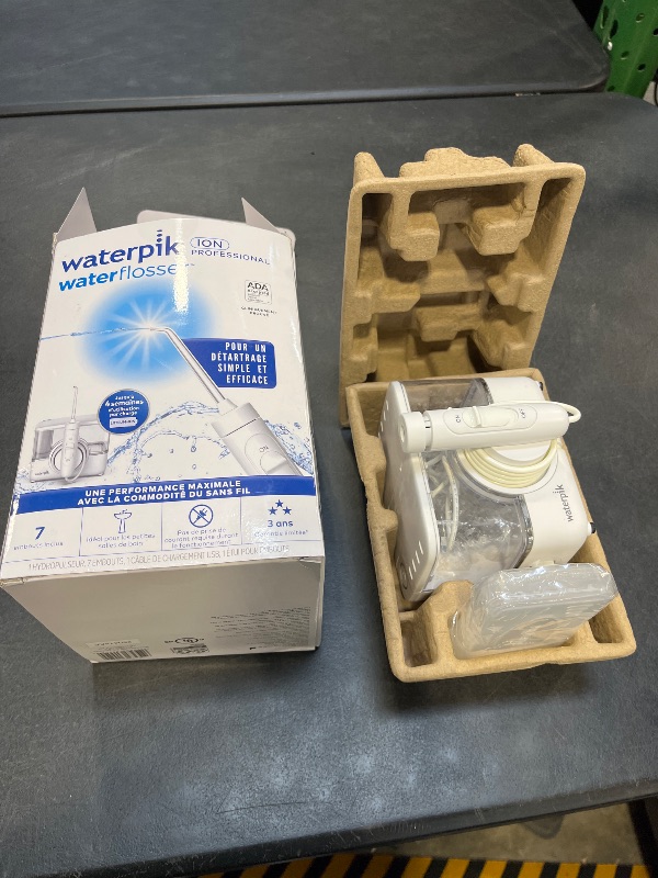 View 2 of Waterpik ION Rechargeable Water Flosser with 10 Settings, 7 Tips, White