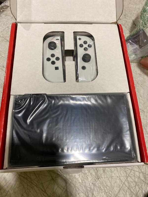 View 4 of Nintendo Switch OLED Model w/ White Joy-Con