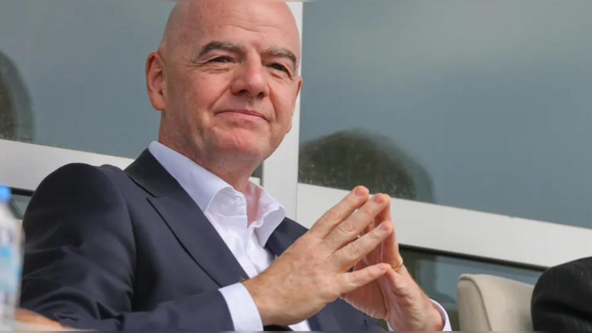 FIFA President Gianni Infantino seated at an international football event