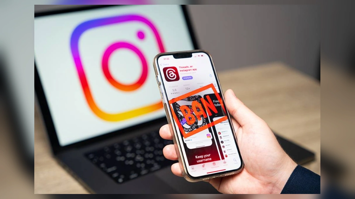 Instagram and Threads apps shown on a smartphone with a ban warning