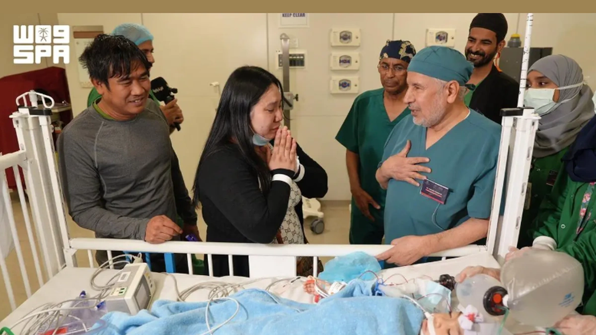 Saudi medical team and family after conjoined twins separation surgery