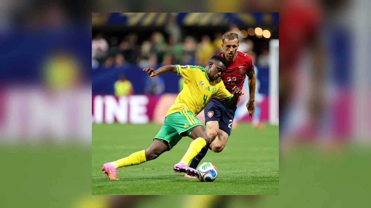 South Africa player battling for the ball against Czechia during a World Cup match