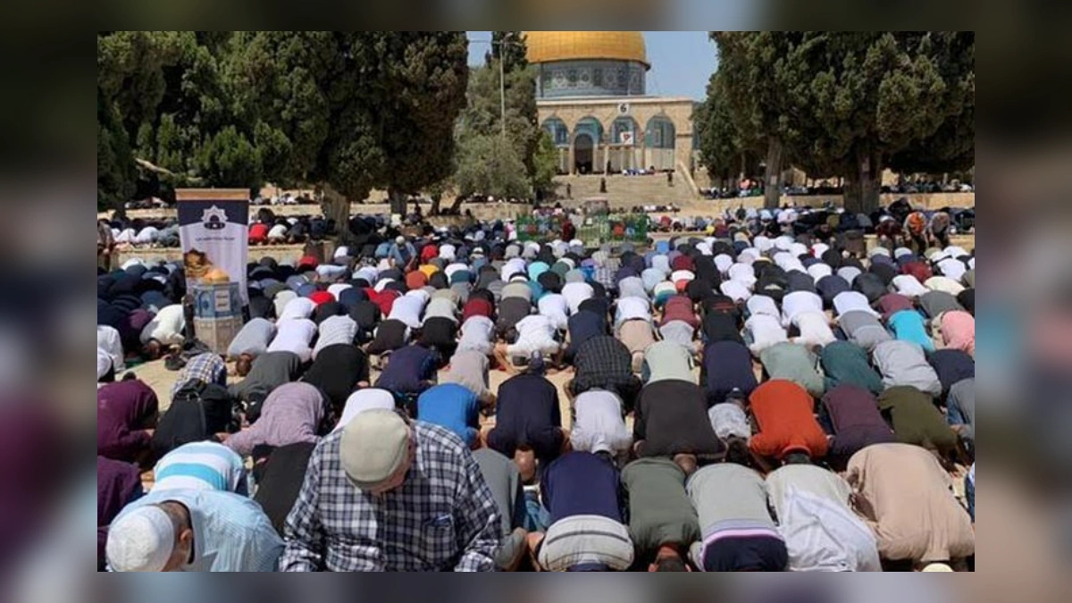 Palestinians performing Friday prayers at Al Aqsa Mosque compound in Jerusalem