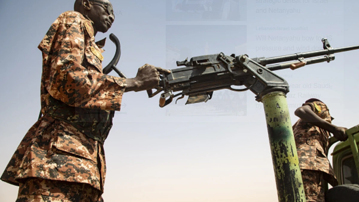 Sudanese soldiers near a mounted weapon amid conflict