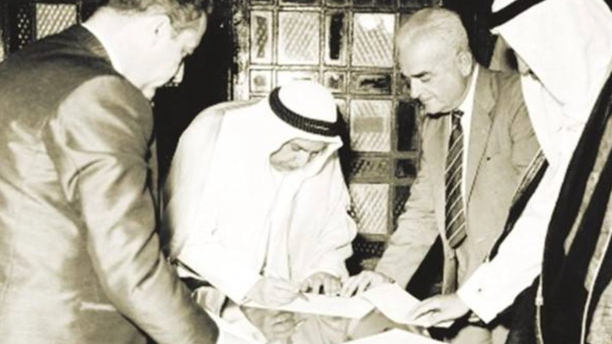 Historical Kuwaiti independence document signing and state-building milestone