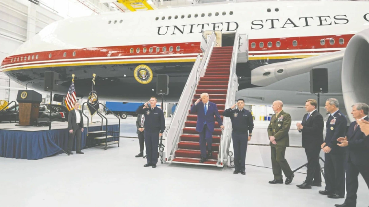 Donald Trump visiting a Boeing 747 aircraft being prepared as Air Force One
