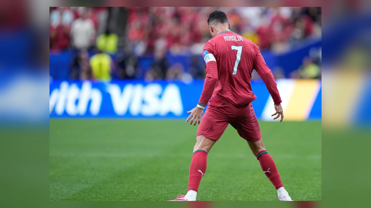 Portuguese football player in red kit during a World Cup match