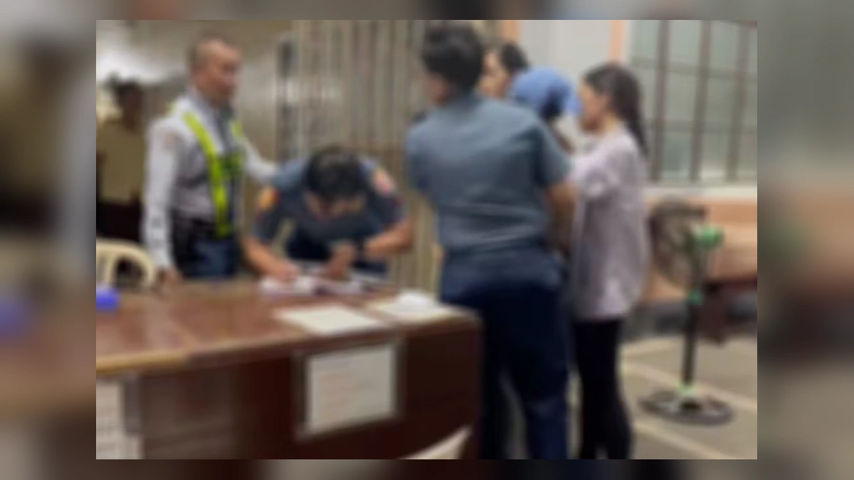 Police and school staff during investigation at Tacloban school shooting
