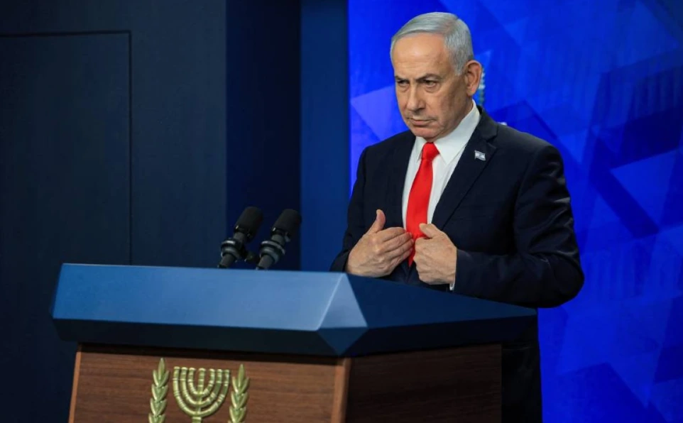 Israeli Prime Minister Benjamin Netanyahu speaking at a podium