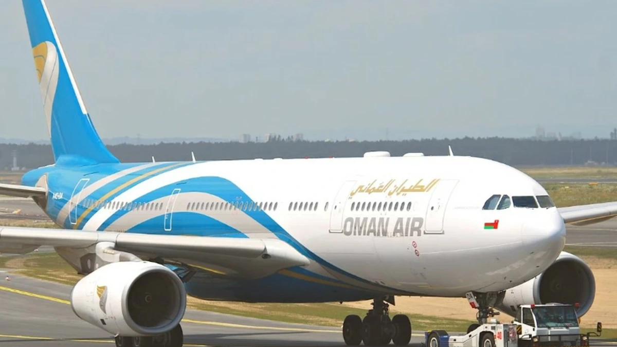 Oman Air aircraft on airport tarmac as Kuwait services resume
