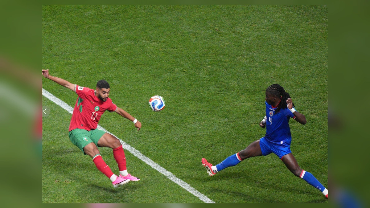 Morocco and Haiti players in action during their World Cup match