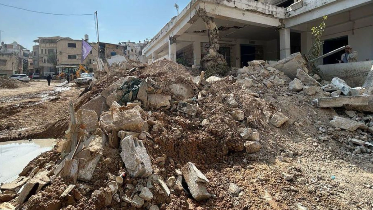 Rubble and damaged infrastructure in occupied Palestinian territory amid settlement debate