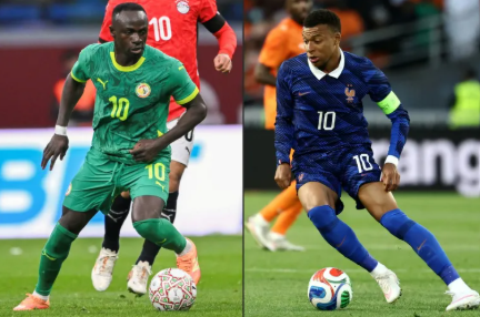 France striker scoring against Senegal in a World Cup stadium