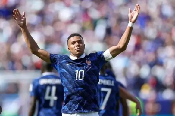 French football star surrounded by record and goal milestone graphics