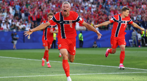 Norway striker scoring against Iraq on the national team's World Cup return