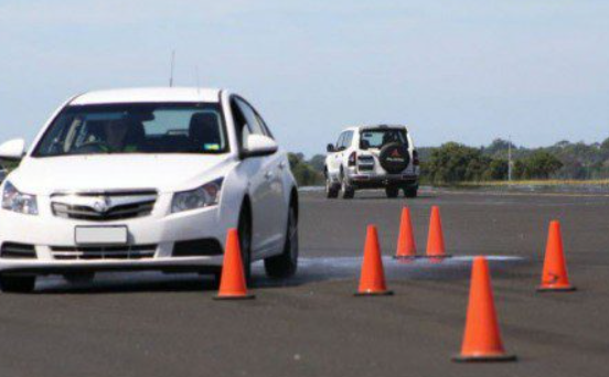 Illustration of Kuwait driving test appointment schedule and traffic cone