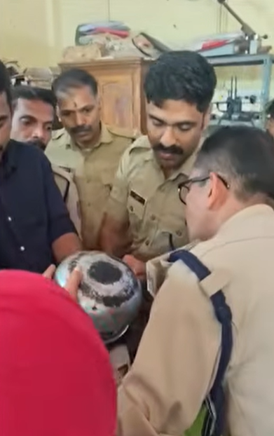Illustration of fire and rescue team helping a child after aluminum pot got stuck on head
