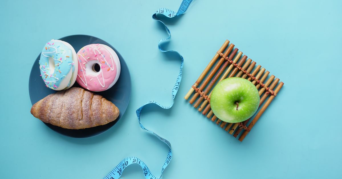 Contrast of healthy and indulgent foods with a measuring tape for weight management.