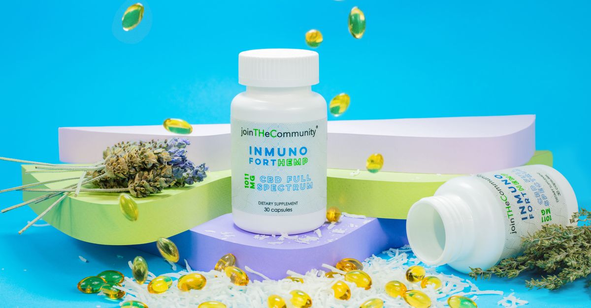 CBD capsules, lavender, and hemp on a vibrant blue background.