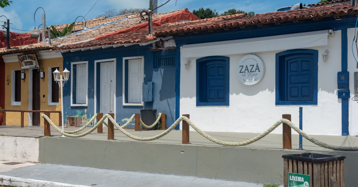 Charming street view of Arraial d'Ajuda, Bahia showcasing vibrant architecture.