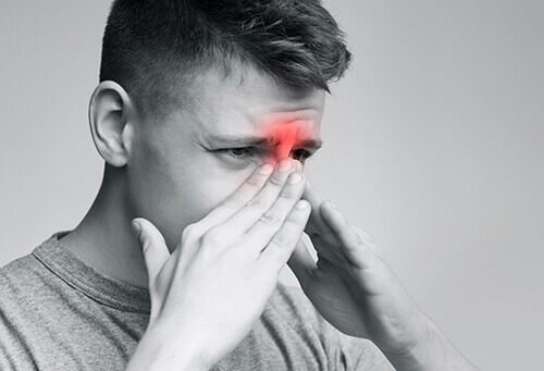 a man suffering from the adenoid problem