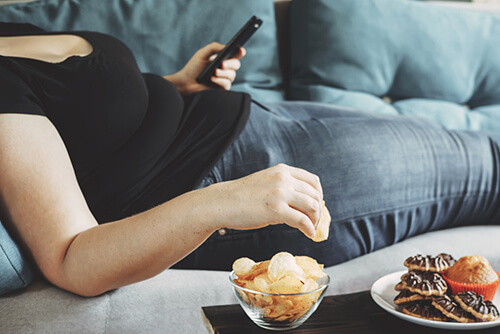 portraying a girl having a relaxed session which is a cause of diverticulitis