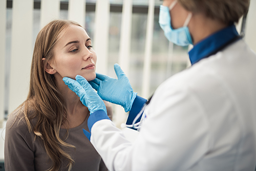 an image showing a patient with an ENT specialist